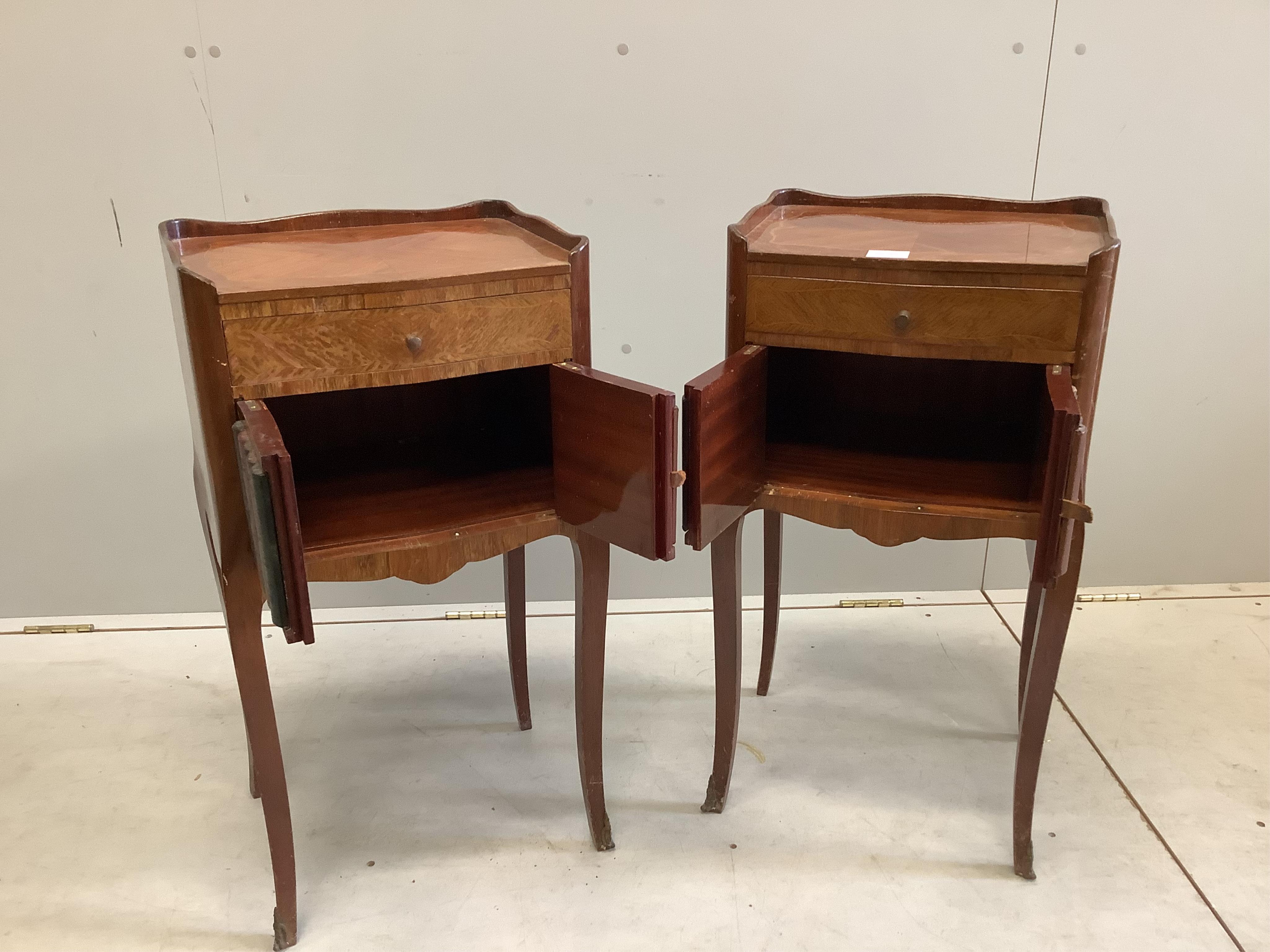 A pair of Louis XV style banded kingwood bedside cabinets, with faux book front doors beneath drawers, width 39cm, depth 30cm, height 73cm. Condition - poor to fair